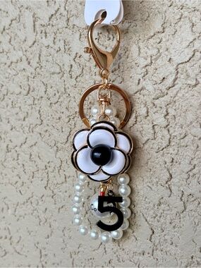 Luxe Gold & White Flower Keychain Charm with Black Accents